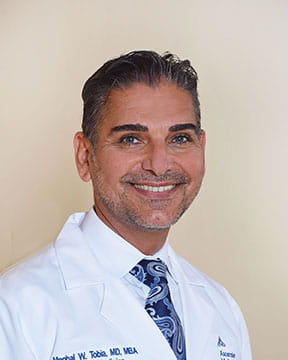 Dr. Manhal W. Tobia