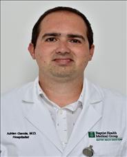 Dr. Adrian          Garcia