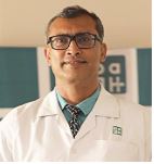 Dr. Tushar Shah