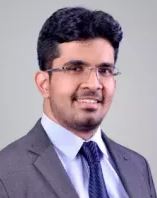 Dr. Arjun R