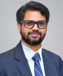 Dr. Rakesh T R