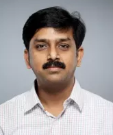 Dr. Suman S