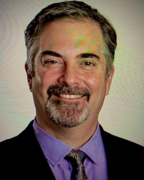 Dr. Michael L. Caravelli,