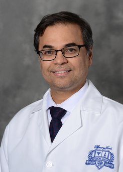 Dr. Dhananjay A Chitale
