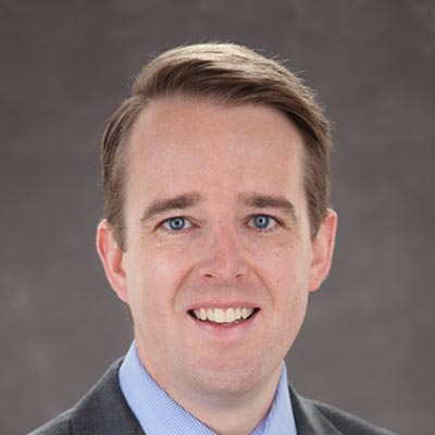 Dr. Colin C Buchanan