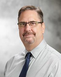 Dr. Lawrence  Kelly