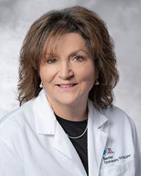 Dr. Maria                                             Theodorou