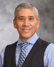 Dr. John            Benavidez