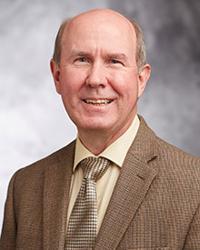 Dr. Kenneth           Petersen