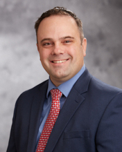 Dr. Justin                         Watkins