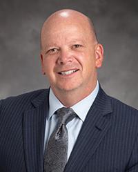 Dr. J. David            Cowden