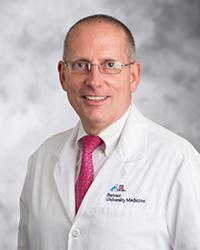 Dr. Michael                 Fallon