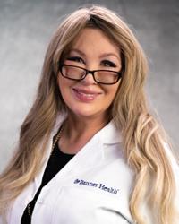 Dr. Sharon                                 Eskam