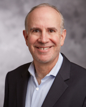 Dr. David                     Savage