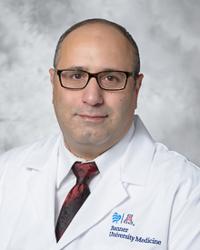 Dr. Abd                                Qannus