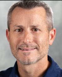 Dr. Dustin             Brisco