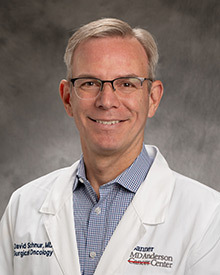 Dr. David              Schnur.