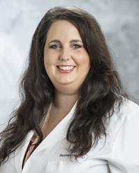 Dr. Adrienne                Jones-Adamczyk