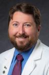 Dr. Mark L        McAllister