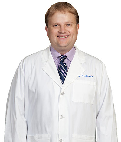 Dr. Daniel          E Smith